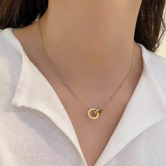 Roman numeral-engraved circles complemented by sparkling cubic zirconia - Picture 2 of 5